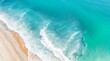 © Shamim Akhtar - Ocean waves on the beach as a background. Beautiful natural summer vacation holidays background. Aerial top down view of beach and sea with blue water waves with Generative Ai Technology.