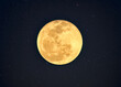 © Mumemories - Yellow full moon with crater textured glowing with starry in night sky