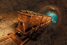 Coal Mine Carts Or Wagons Slowly Moving Through Narrow Underground Tunnel.