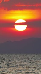Wall Mural - beautiful landscape with sunset over sea, krabi, thailand. vertical video