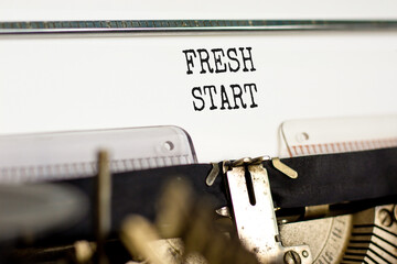 Wall Mural - Fresh start and motivational symbol. Concept words Fresh start typed on beautiful old retro typewriter. Beautiful white background. Business motivational and Fresh start concept. Copy space.