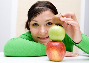 Sticker - attractive brunette woman holding apple