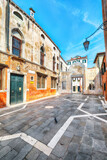 Fototapeta Uliczki - Fabulous cityscape of Venice with narrow streets and traditional buildings.