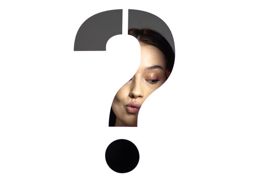 portrait of a beautiful girl behind stencil question mark
