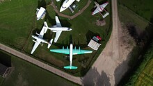 Aerial View Rising Above De Havilland Historical Preserved Aircraft Museum Collection On Hertfordshire Farming Countryside