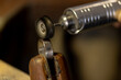 © Wavebreak Media - Close up of tools making jewellery, polishing ring in jewellery workshop