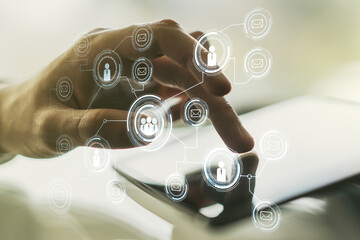 Poster - Double exposure of social network icons concept and hand working with a digital tablet on background. Networking concept