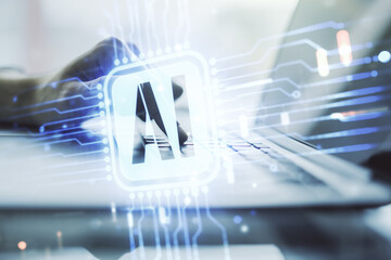 Poster - Double exposure of creative artificial Intelligence icon with hands typing on laptop on background. Neural networks and machine learning concept