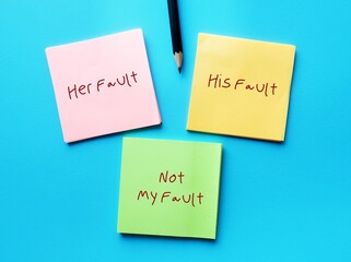 On blue background, three notes with handwriting HIS AND HER FAULT, NOT MY FAULT, concept of fault finder - very critical and hence find mistakes in people