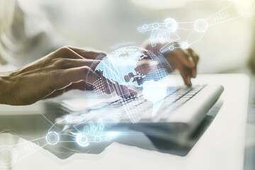 Aufkleber - Double exposure of robotics technology with world map hologram and hands typing on laptop on background. Research and development software concept