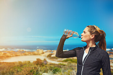 woman drink water, beach and fitness with blue sky, athlete outdoor with hydration and mockup space.