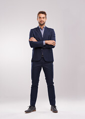 Poster - Full body portrait of business man, arms crossed with confidence isolated on studio background. Professional mindset, career success and mockup space with corporate male employee and leadership
