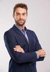 Poster - Portrait of business man, arms crossed with confidence in a suit isolated on studio background. Professional mindset, career success and businessman with corporate male employee and leadership