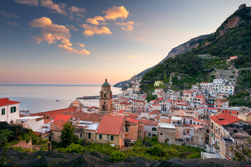 Wall Mural - Amalfi, Italy. Cityscape image of famous coastal city Amalfi, located on Amalfi Coast, Italy at sunset.