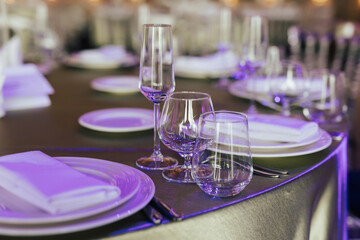 Wall Mural - Close-up of table setting for holiday. Wedding table with cutlery for guests in the restaurant.