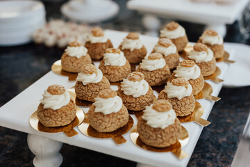 Desserts for holiday. Cakes on the plate.