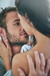 © Adene S/peopleimages.com - Love, happy and couple in a bedroom, intimate moment and romance with a kiss, date and loving. Partners, happy man and woman embrace, romantic and happiness with marriage, relationship and hug