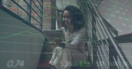 Poster - Animation of financial data processing on african american woman having video call on digital tablet