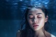 Attractive young Asian wet hair woman model with perfect fresh skin on underwater simulation of lighting. Generative Ai.