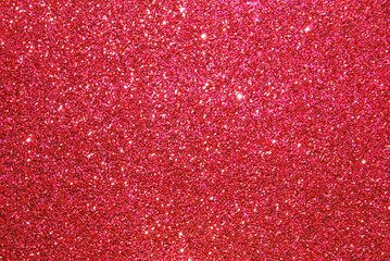 pink defocused glitter texture as background