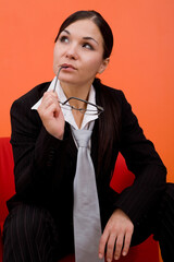 Sticker - attractive brunette businesswoman on orange background