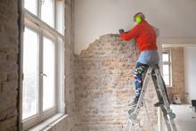 A Woman Is Renovating Her Home