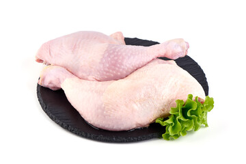 Wall Mural - Raw chicken leg quarters, isolated on white background.