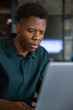 © Jovo Jovanovic/Stocksy - Focused male entrepreneur working on laptop at cafe