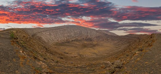 panoramic view over the volcanic crater of caldera blanca on lanzarote