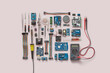 © Yaroslav Danylchenko/Stocksy - Various computer components, electronics, wires.
