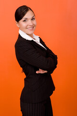 Poster - attractive brunette woman on orange background