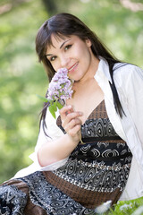 Poster - happy woman relaxing on grass