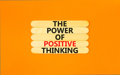 Wall Mural - Positive thinking symbol. Concept words The power of positive thinking on wooden stick. Beautiful orange table orange background. Business, motivational positive thinking concept. Copy space.