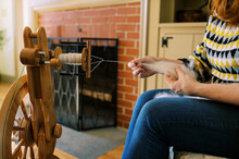Woman Working With Wool In Her Living Room