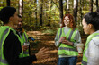 © Oleksii Syrotkin/Stocksy - Team volunteering friend dialogue forest together lunch