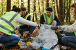 © Oleksii Syrotkin/Stocksy - Ecology campaign plan litter nature teamwork plastic wrap