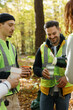 © Oleksii Syrotkin/Stocksy - Vacuum flask beverage activist team happy  togetherness