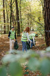 © Oleksii Syrotkin/Stocksy - Volunteer trash wood together clean environmental