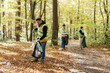 © Oleksii Syrotkin/Stocksy - volunteering ecology pollute bag junk daylight