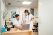 © Santi Nuñez/Stocksy - Staff of hospital working with laptop