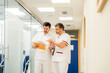 © Santi Nuñez/Stocksy - Staff of the hospital talking