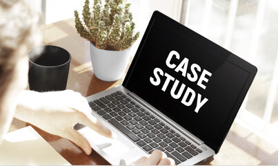 Aufkleber - Businessman typing text Case Study in laptop on office background