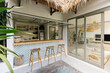 © Mihajlo Ckovric/Stocksy - Image of tropical design home