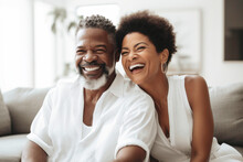 Portrait Of Happy Mature Successful Black Couple Laughing Together At Home. Generative AI.