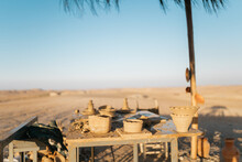 Table With Ceramics In The Desert