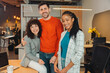 © VICTOR TORRES/Stocksy - Portrait of happy diverse colleagues in start-up office