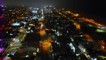 Aerial Flyover In Santa Monica Neighborhood And Ocean With City Lights At Night