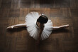 © Yumiko Kinoshita - ballerina stretching on the floor