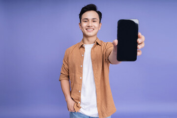 Photo of young Asian man on background