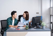 © Timeimage - Photo of two young Asian business person working at office